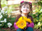 عکس دختر بچه با گل زیبا