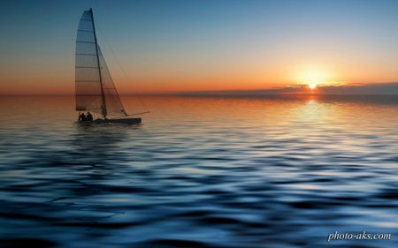 منظره قایق بادبانی و غروب boat at sunset