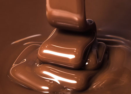 پس زمینه شکلات مایع خوشمزه brown chocolate sweet