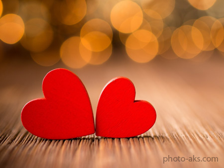 والپیپر عاشقانه از دو قلب قرمز red hearts wallpaper