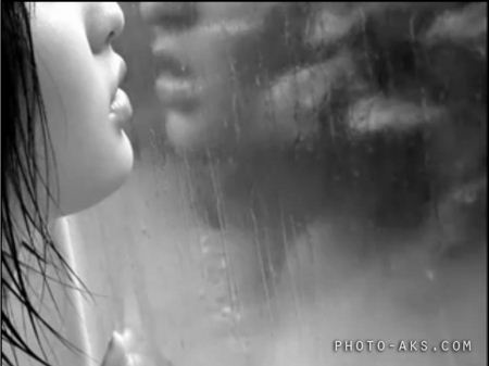 دختر پشت پنجره بارانی