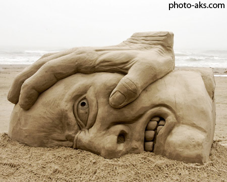 جالب ترین مجسمه های شنی face sand statue