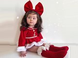 دختر بچه با لباس کریسمس